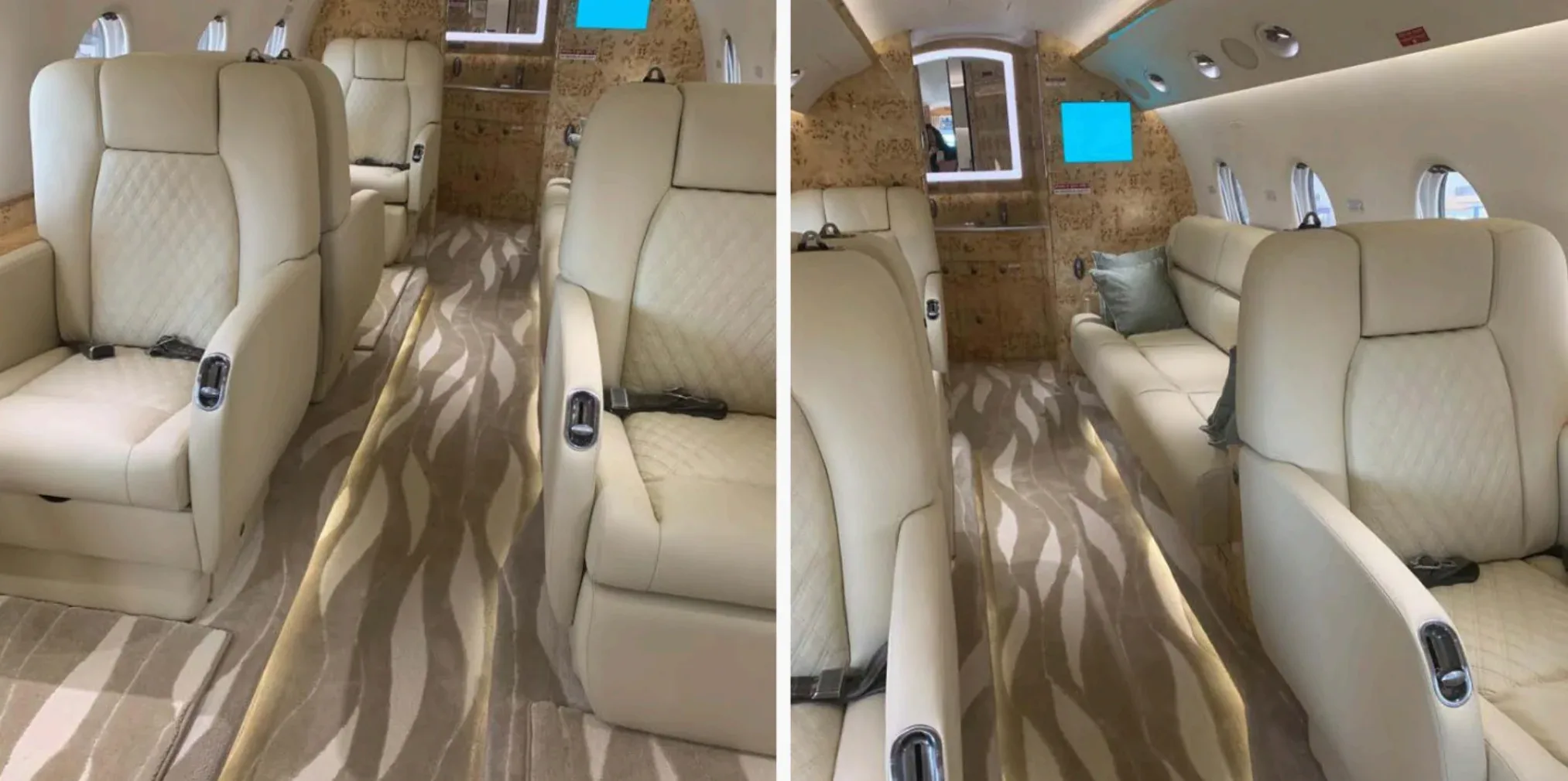 The luxurious interior cabin of a private jet with cream quilted seats and a patterned carpet.