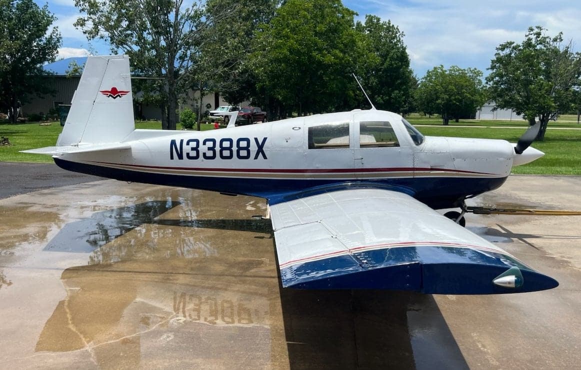 Side view of the N3388X aircraft on the ground.