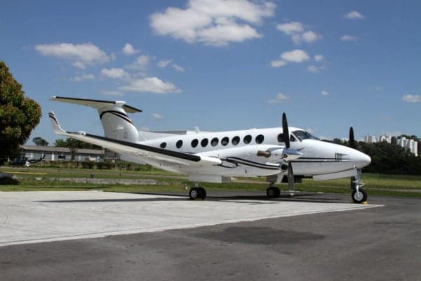 A King Air aircraft parked on the tarmac.