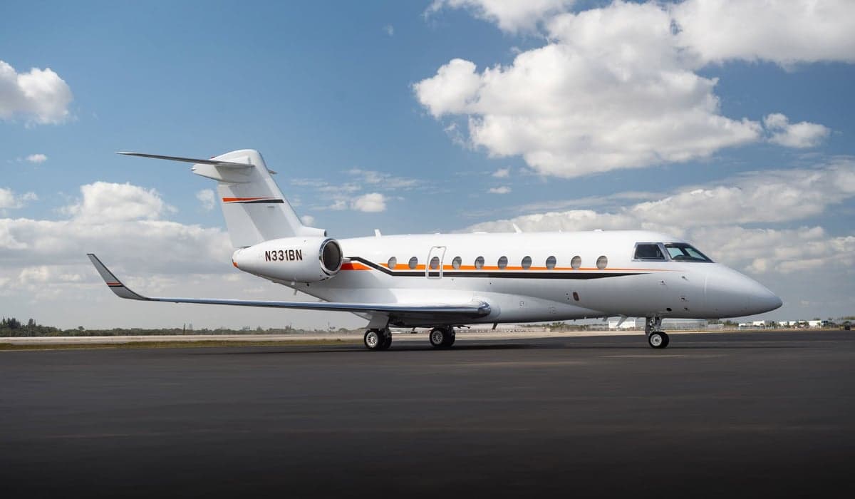 A Gulfstream G650 is parked on the tarmac.