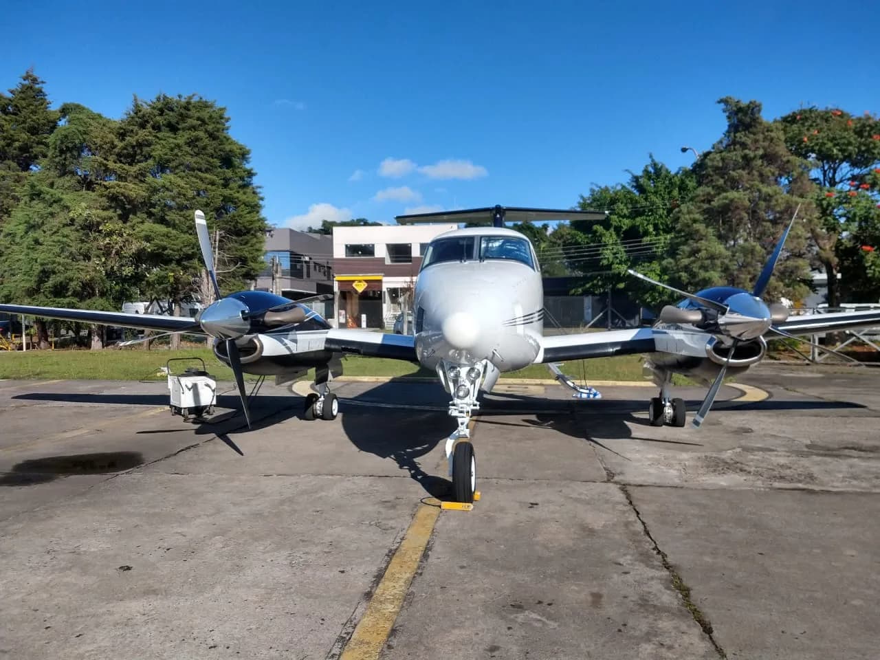 Front view of a Beechcraft King Air 200 on the tarmac.