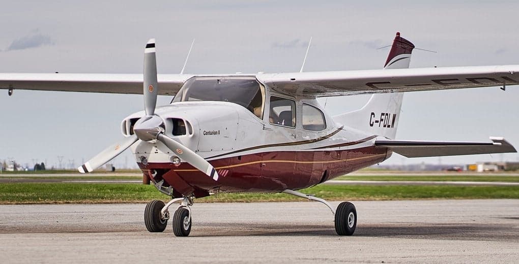 Front view of a Cessna Centurion II on the tarmac.