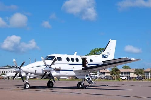 A Beechcraft King Air with tail number N20S parked on the tarmac.