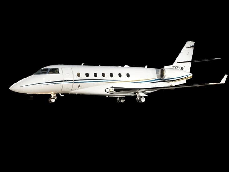 A white Hawker 4000 aircraft is shown in a side profile view against a black background.