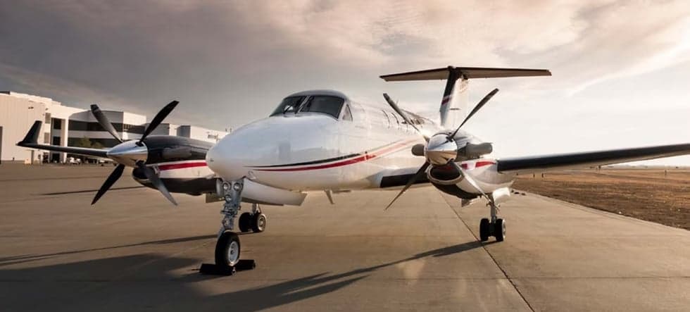 Front view of a King Air aircraft on the tarmac.